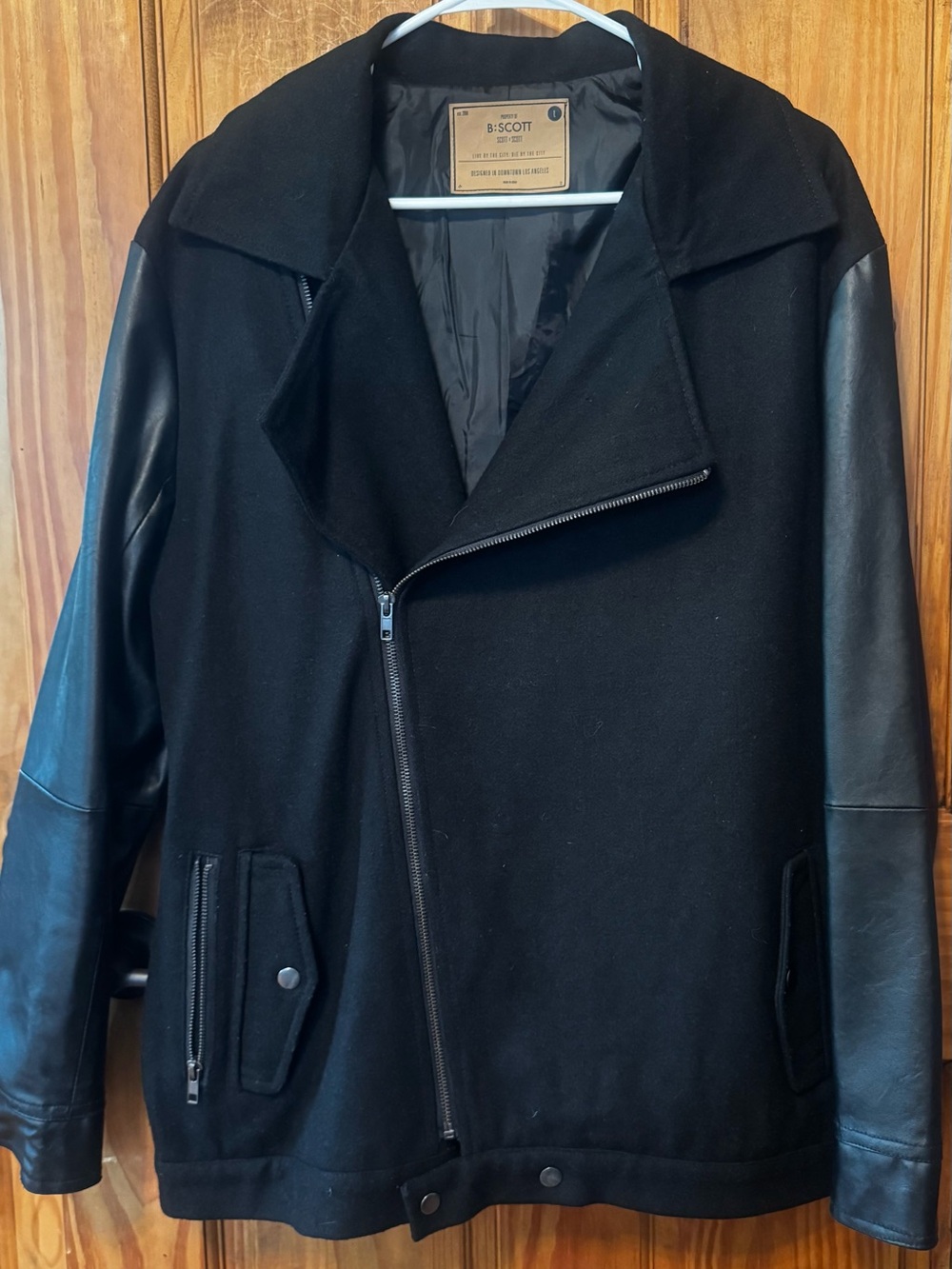 B.SCOTT hybrid moto jacket featuring a wool-blend body and contrasting faux-leat